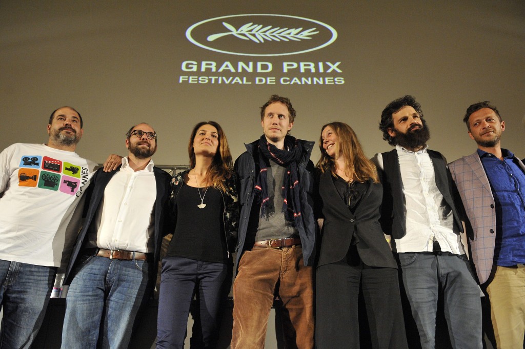 Budapest, 2015. május 28. Rajna Gábor és Sipos Gábor producerek, valamint Zabezsinszkij Éva casting direktor, Nemes Jeles László rendezõ-forgatókönyvíró, Clara Royer társforgatókönyvíró, Röhrig Géza New Yorkban élõ magyar amatõr színész, fõszereplõ és Molnár Levente színész (b-j) a 68. Cannes-i Nemzetközi Filmfesztiválon négy díjjal elismert Saul fia címû film sajtótájékoztatóján Budapesten, a Corvin moziban 2015. május 28-án. MTI Fotó: Kovács Tamás